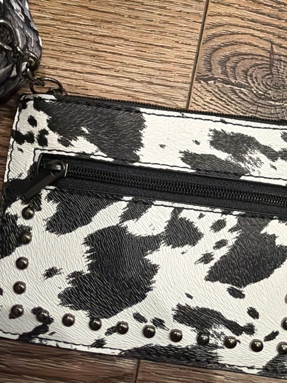 Black & White Cowhide Crossbody Sling Bag with Concho Accent